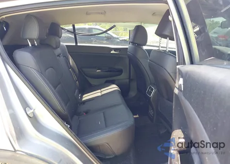 2021 Kia Sportage Ex z USA, uszkodzony, nr VIN KNDPNCAC9M7896788